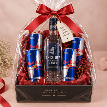 Luxe zwarte cadeaudoos met Eristoff Vodka en vier blikjes Red Bull, afgewerkt met rode decoratie, transparante folie en rode st